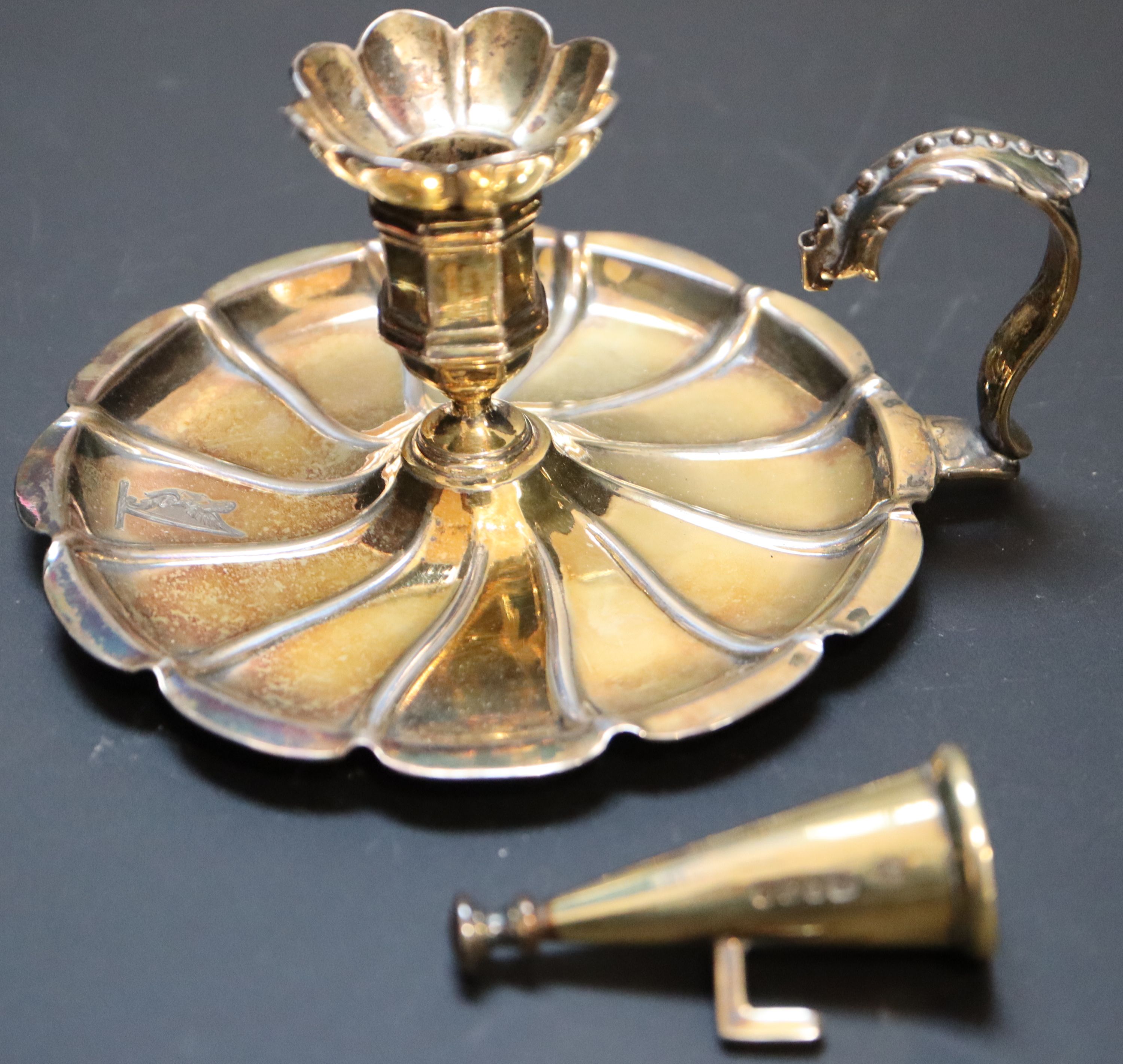 A Victorian silver gilt miniature chamberstick, height 6.5cm, 4oz.